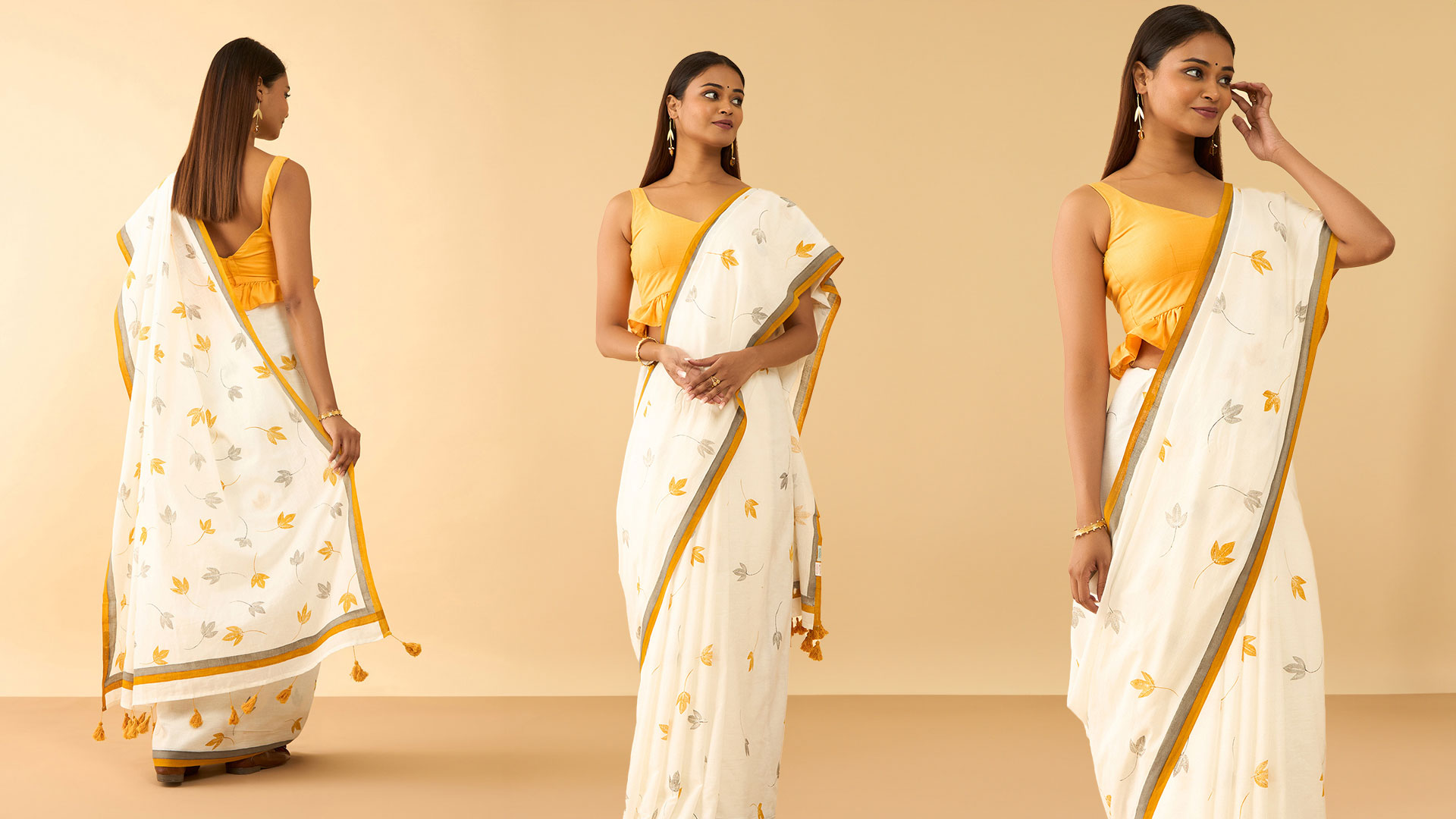 A khadi saree in ochre and light grey border 